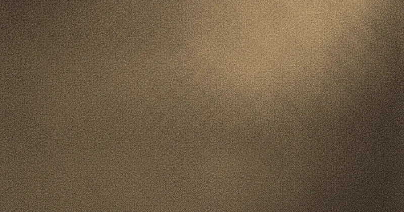 Abstract art: one soft amber light path opening a wide illuminated area in a dark graphite field, costing the rest of the frame nothing